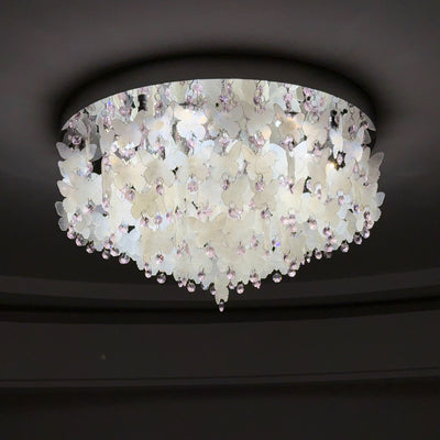 Lustre encastré LED en forme de papillon en cristal créatif contemporain en acier inoxydable avec carillon éolien en coquillage pour chambre à coucher 