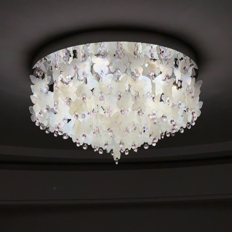 Lustre encastré LED en forme de papillon en cristal créatif contemporain en acier inoxydable avec carillon éolien en coquillage pour chambre à coucher 