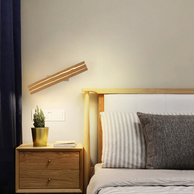 Moderne minimalistische rechteckige drehbare Log-Crack-Holz-Eisen-LED-Wandleuchte für das Schlafzimmer 