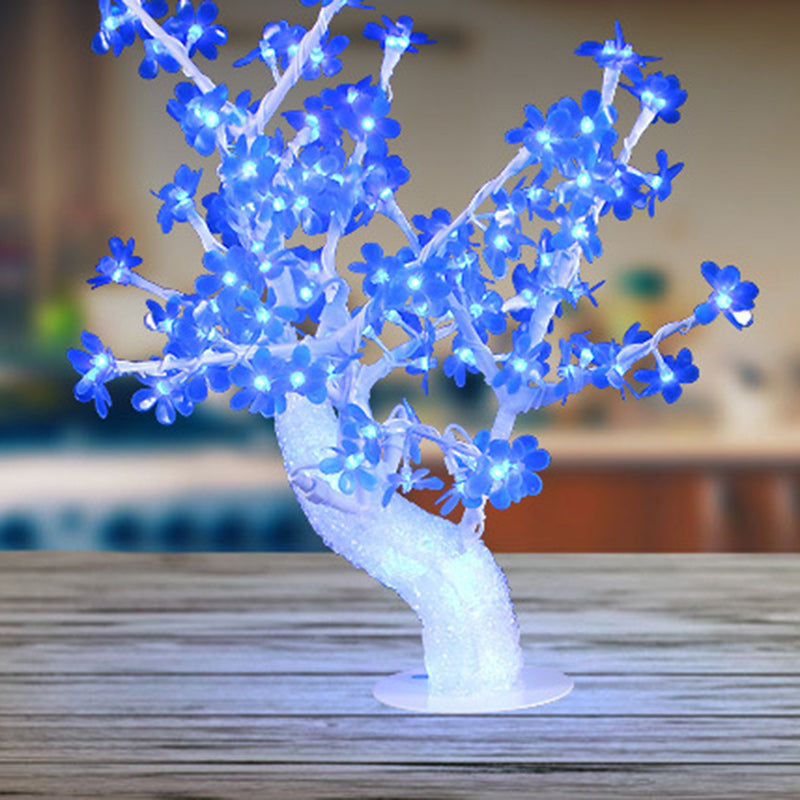 Lampe de table LED en fer et plastique avec base ronde en forme de pétale de fleur d&