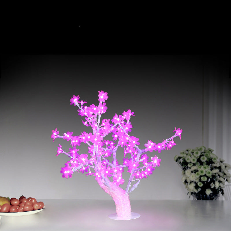 Lampe de table LED en fer et plastique avec base ronde en forme de pétale de fleur d&