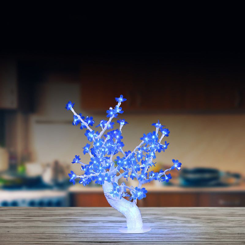 Lampe de table LED en fer et plastique avec base ronde en forme de pétale de fleur d&