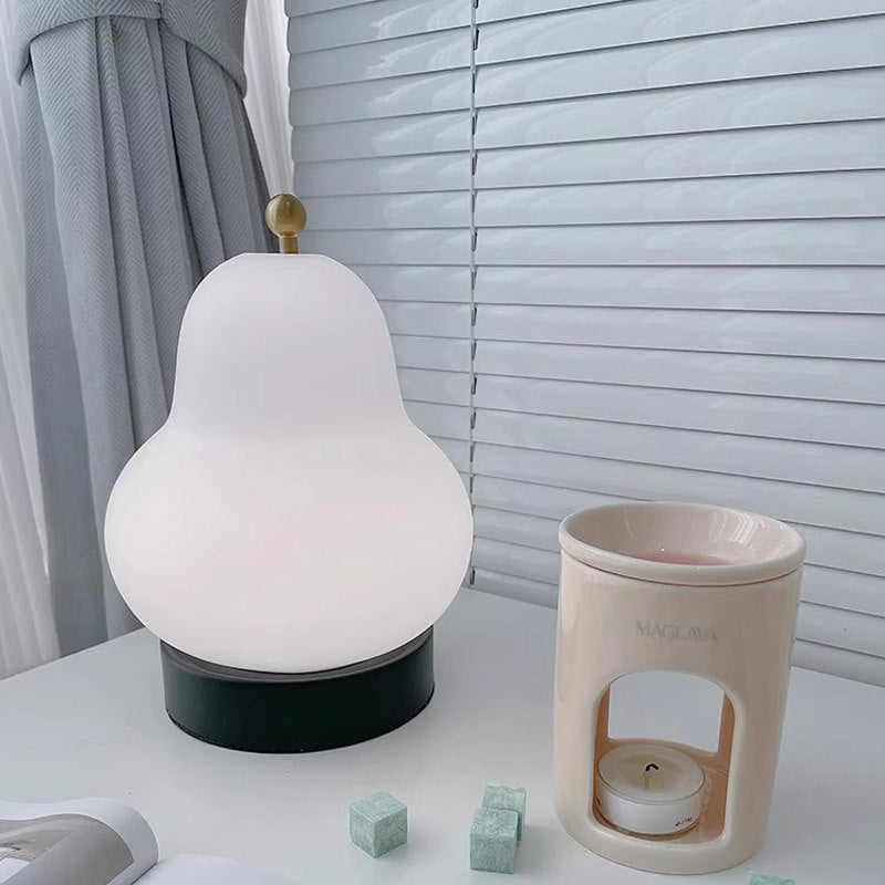 Modern Minimalist Cream Pear Disc Base Hardware Glass LED Table Lamp For Bedroom