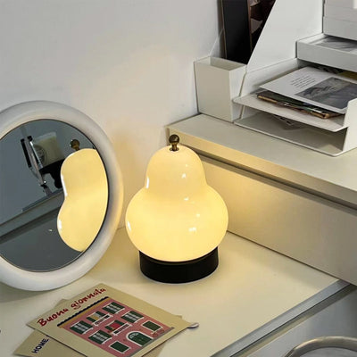 Modern Minimalist Cream Pear Disc Base Hardware Glass LED Table Lamp For Bedroom
