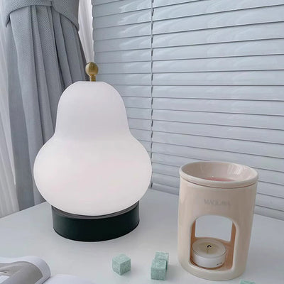 Modern Minimalist Cream Pear Disc Base Hardware Glass LED Table Lamp For Bedroom
