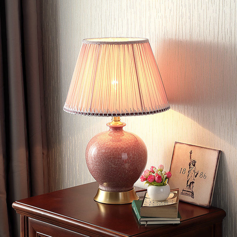 Lampe de table traditionnelle chinoise ovale sphérique ronde en céramique à glaçure cristallisée avec tissu en cuivre à 1 lumière pour chambre à coucher 