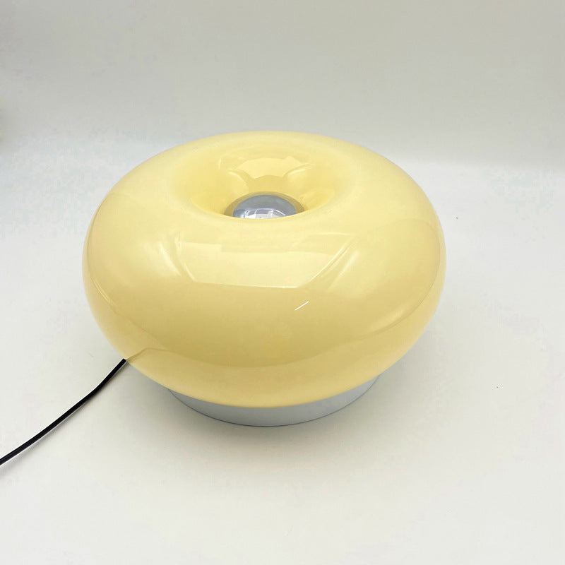 Lámpara de mesa LED de hierro con vidrio ovalado en crema minimalista moderna para dormitorio 