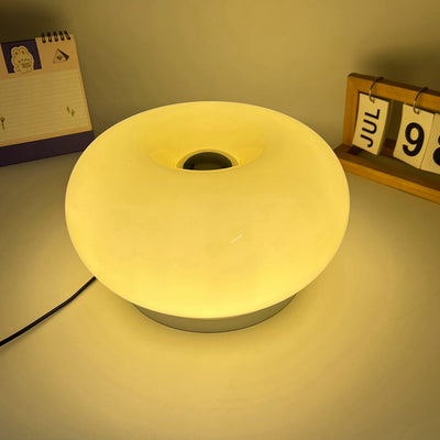 Lámpara de mesa LED de hierro con vidrio ovalado en crema minimalista moderna para dormitorio 
