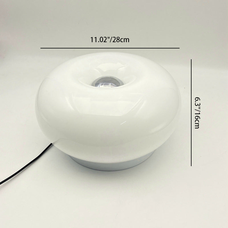 Lámpara de mesa LED de hierro con vidrio ovalado en crema minimalista moderna para dormitorio 