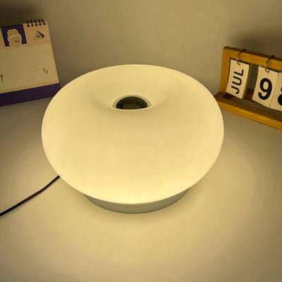 Lámpara de mesa LED de hierro con vidrio ovalado en crema minimalista moderna para dormitorio 