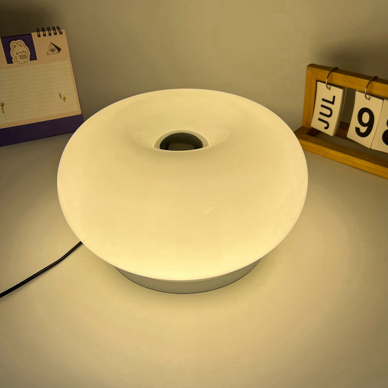 Lámpara de mesa LED de hierro con vidrio ovalado en crema minimalista moderna para dormitorio 