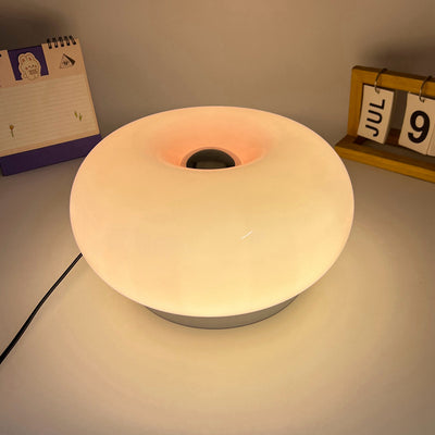 Lámpara de mesa LED de hierro con vidrio ovalado en crema minimalista moderna para dormitorio 