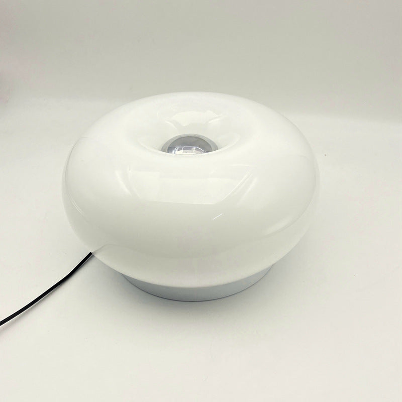 Lámpara de mesa LED de hierro con vidrio ovalado en crema minimalista moderna para dormitorio 