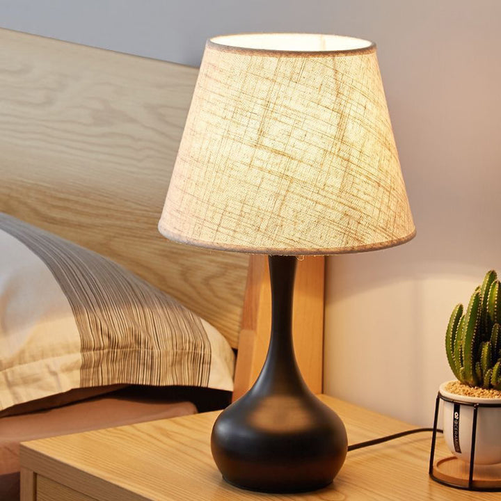 Lámpara de mesa contemporánea escandinava de cilindro redondo con base de lágrima de hierro y tela de 1 luz para dormitorio 