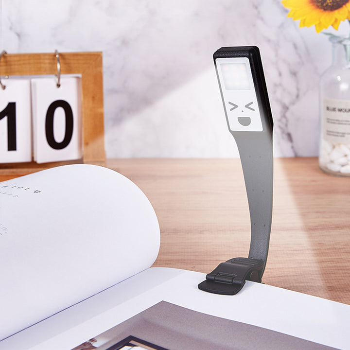 Zeitgenössische kreative rechteckige Smiley-Plastik-LED-Tischlampe Buchclip-Lampe für das Schlafzimmer 