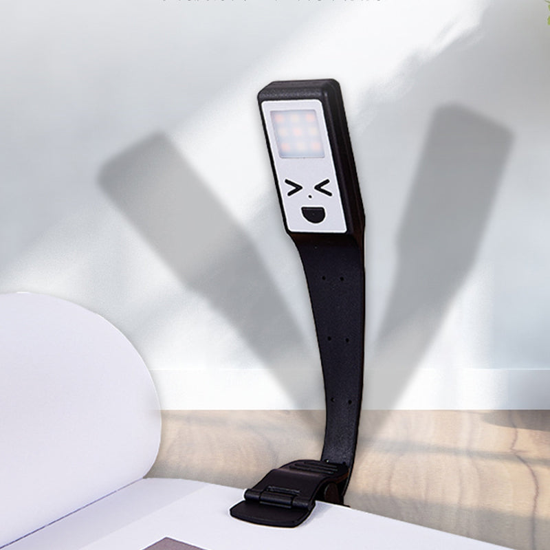 Zeitgenössische kreative rechteckige Smiley-Plastik-LED-Tischlampe Buchclip-Lampe für das Schlafzimmer 