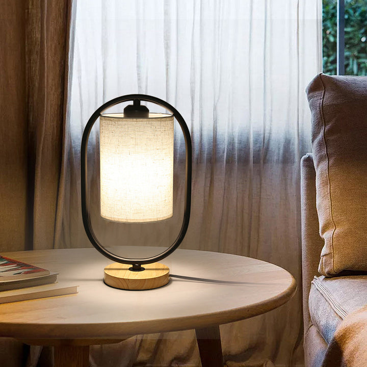 Lámpara de mesa contemporánea escandinava de cilindro ovalado de madera maciza metal tela de 1 luz para dormitorio 