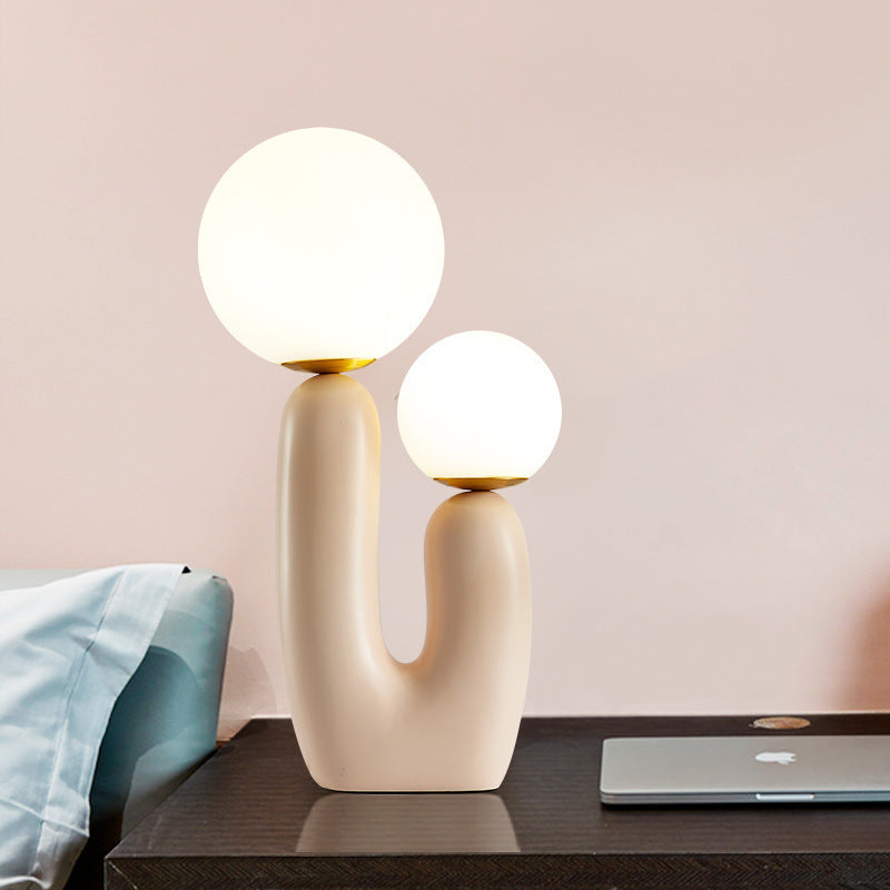 Contemporary Nordic Glass Ball Shade Resin U-Shaped Base 2-Light Table Lamp For Bedroom