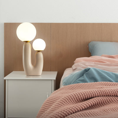 Contemporary Nordic Glass Ball Shade Resin U-Shaped Base 2-Light Table Lamp For Bedroom