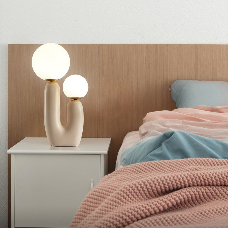 Contemporary Nordic Glass Ball Shade Resin U-Shaped Base 2-Light Table Lamp For Bedroom