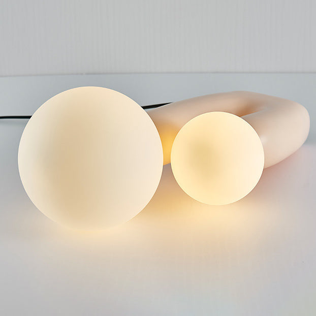 Contemporary Nordic Glass Ball Shade Resin U-Shaped Base 2-Light Table Lamp For Bedroom