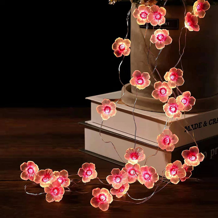 Luces de cadena decorativas LED de alambre de cobre con flor de ciruelo creativa contemporánea para dormitorio 