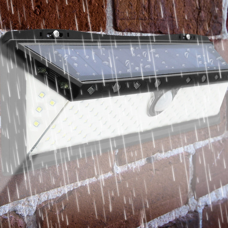 مصباح حائط خارجي شمسي LED مقاوم للماء بمستشعر بشري ABS مثلث صناعي عصري للحديقة 