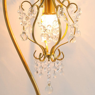 Lampe de table contemporaine de luxe avec cadre en fer courbé et décoration en cristal à 1 lumière pour chambre à coucher 
