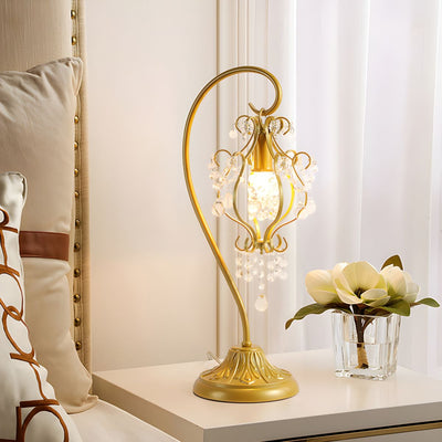 Lampe de table contemporaine de luxe avec cadre en fer courbé et décoration en cristal à 1 lumière pour chambre à coucher 