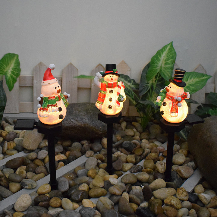 Zeitgenössische kreative Weihnachts-Resin-Schneemann-LED-Solar-Dekoration Bodenstecker Landschaftslicht für den Garten 