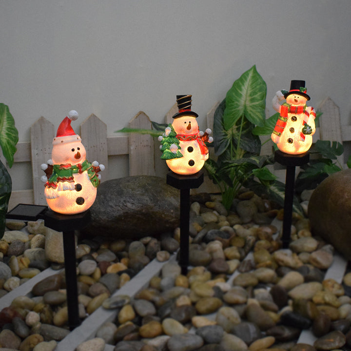 Zeitgenössische kreative Weihnachts-Resin-Schneemann-LED-Solar-Dekoration Bodenstecker Landschaftslicht für den Garten 
