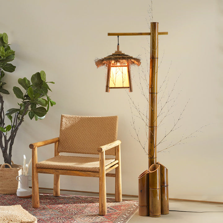 Zeitgenössische kreative Strohdachhütte Schatten Bambusrohrbasis 1-Licht Stehlampe für Esszimmer 