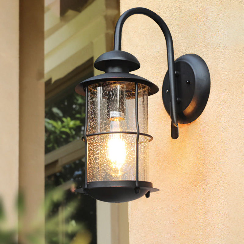 Zeitgenössische Einfachheit Eisenrahmen Glaszylinder 1-Licht Outdoor Wasserdichte Wandleuchte für Garten 
