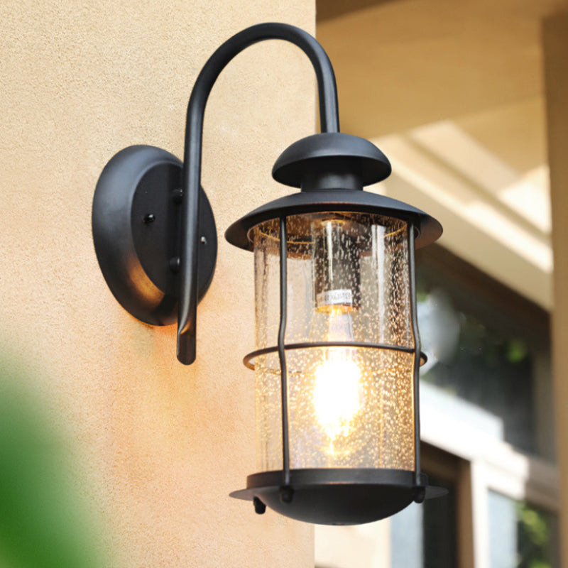 Zeitgenössische Einfachheit Eisenrahmen Glaszylinder 1-Licht Outdoor Wasserdichte Wandleuchte für Garten 
