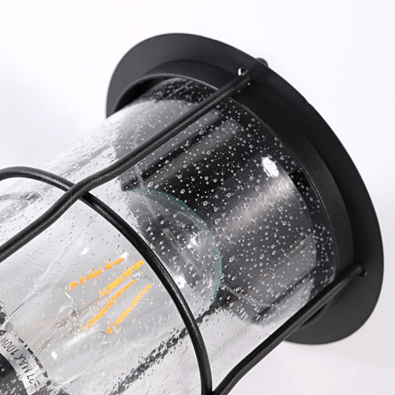 Zeitgenössische Einfachheit Eisenrahmen Glaszylinder 1-Licht Outdoor Wasserdichte Wandleuchte für Garten 