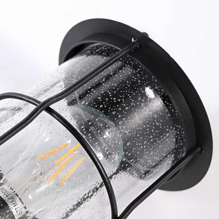 Zeitgenössische Einfachheit Eisenrahmen Glaszylinder 1-Licht Outdoor Wasserdichte Wandleuchte für Garten 