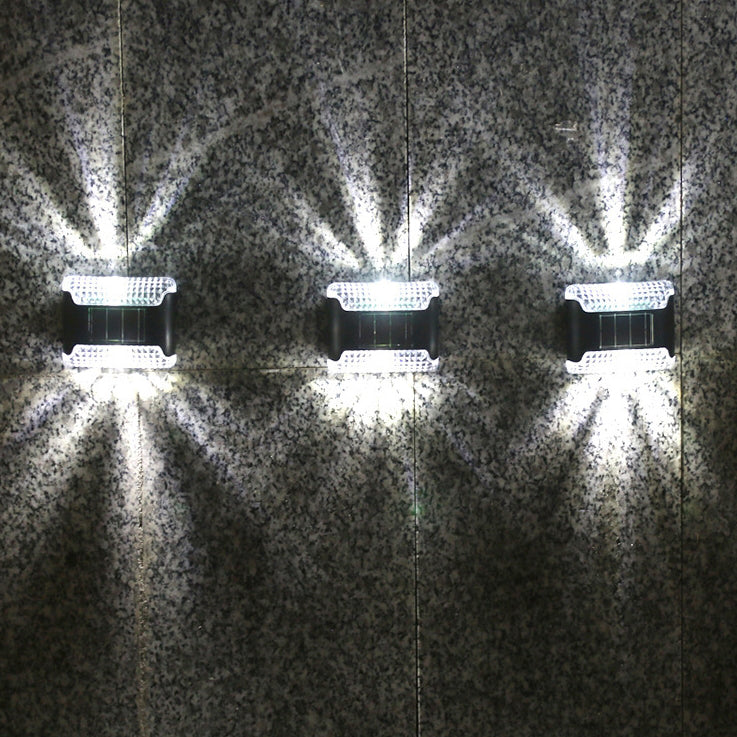 Applique murale extérieure LED rectangulaire en ABS solaire industrielle contemporaine avec éclairage vers le haut et vers le bas pour jardin 