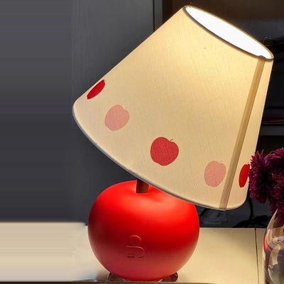 Zeitgenössische kreative geneigte Harz-Apfel-Stoffschirm 1-Licht-Tischlampe für das Schlafzimmer 
