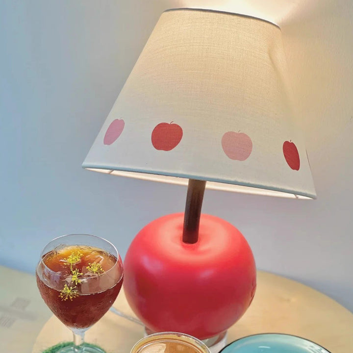 Contemporary Creative Tilted Resin Apple Fabric Shade 1-Light Table Lamp For Bedroom