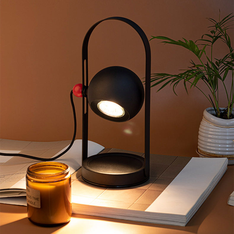 Modern Simplicity Adjustable Iron Spherical Shade 1-Light Portable Melting Wax Table Lamp For Bedroom