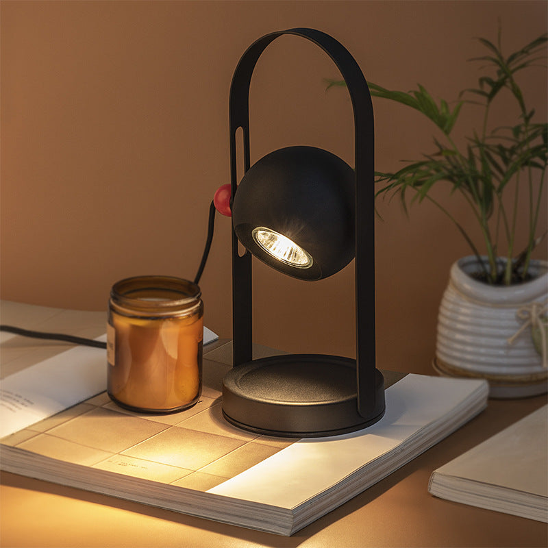 Modern Simplicity Adjustable Iron Spherical Shade 1-Light Portable Melting Wax Table Lamp For Bedroom