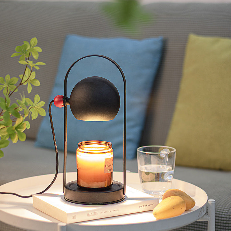 Modern Simplicity Adjustable Iron Spherical Shade 1-Light Portable Melting Wax Table Lamp For Bedroom