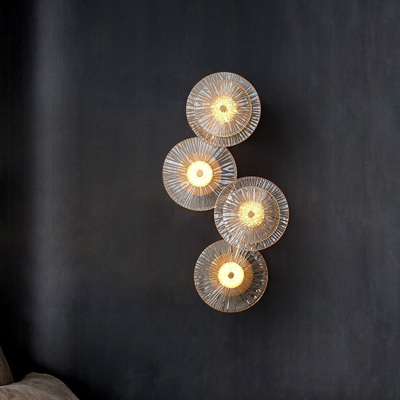 Applique murale LED de luxe contemporaine en laiton géométrique avec disque en verre et design feuille de lotus pour chambre 