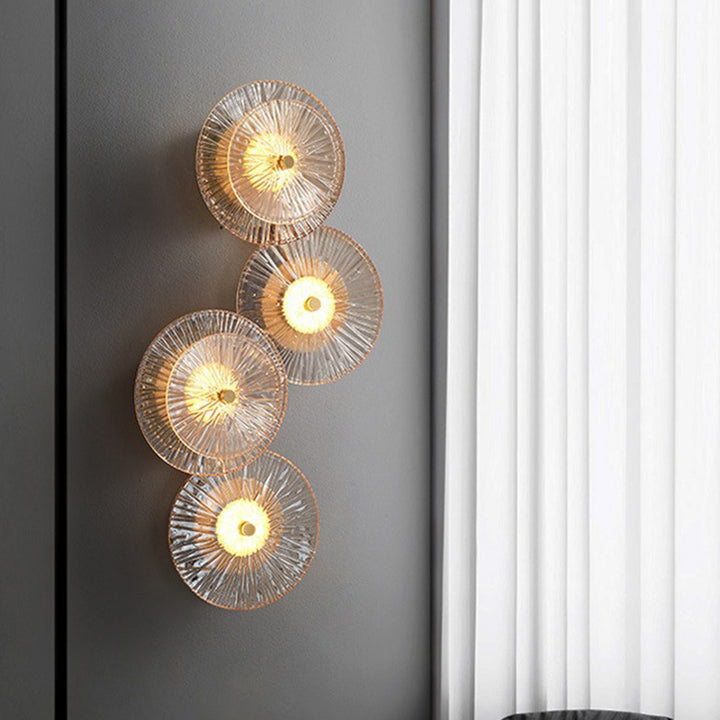 Applique murale LED de luxe contemporaine en laiton géométrique avec disque en verre et design feuille de lotus pour chambre 