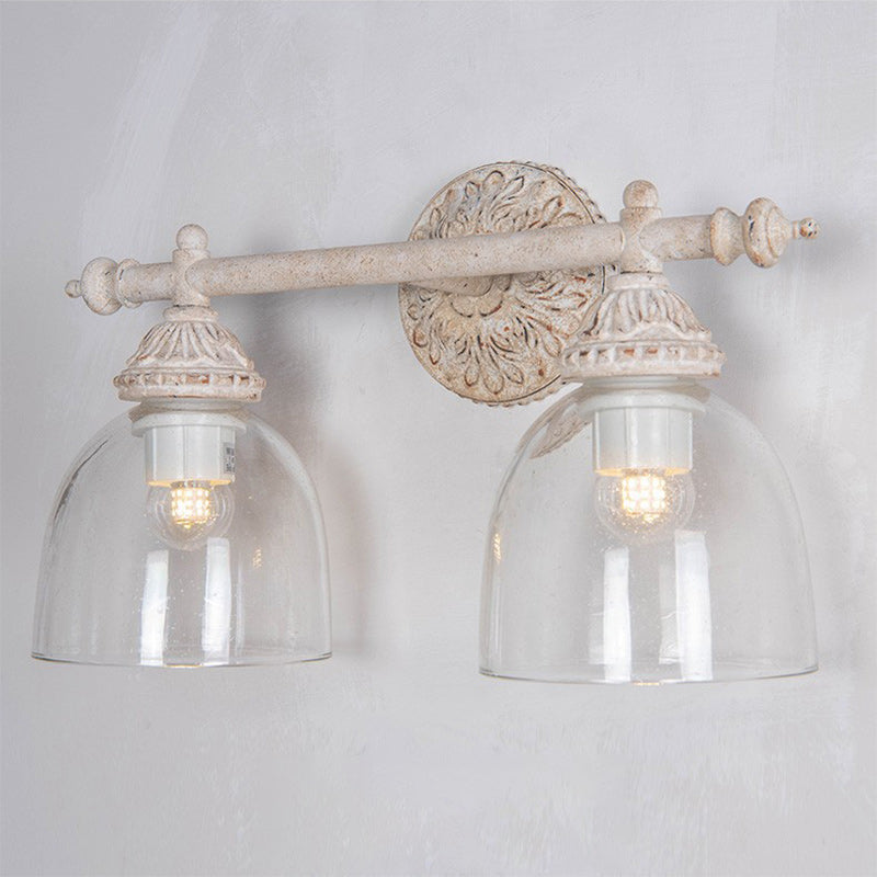 Traditionelle rustikale geschnitzte Eisen-Glas-Becher-Schirm 2-Licht-Spiegel-Front-Wandlampe für Badezimmer 