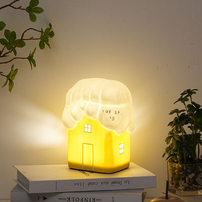 Zeitgenössische kreative Keramik niedliches Schneehäuschen USB LED Tischlampe Nachtlicht für Schlafzimmer 