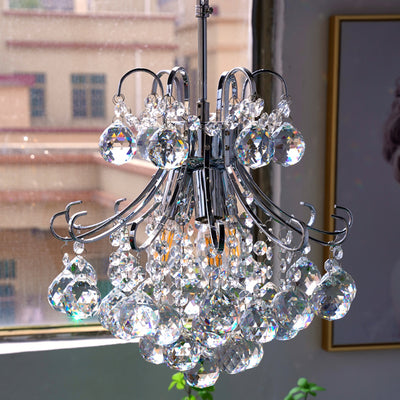 Modern Luxury Crystal String Hardware Arc Frame 4-Light Chandelier For Living Room