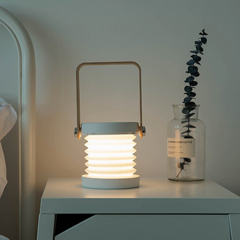 مصباح طاولة LED حديث على الطراز الاسكندنافي قابل للطي ومحمول بأسطوانة خشبية وحديدية لغرفة النوم 
