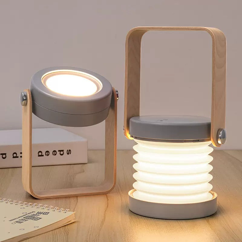 مصباح طاولة LED حديث على الطراز الاسكندنافي قابل للطي ومحمول بأسطوانة خشبية وحديدية لغرفة النوم 