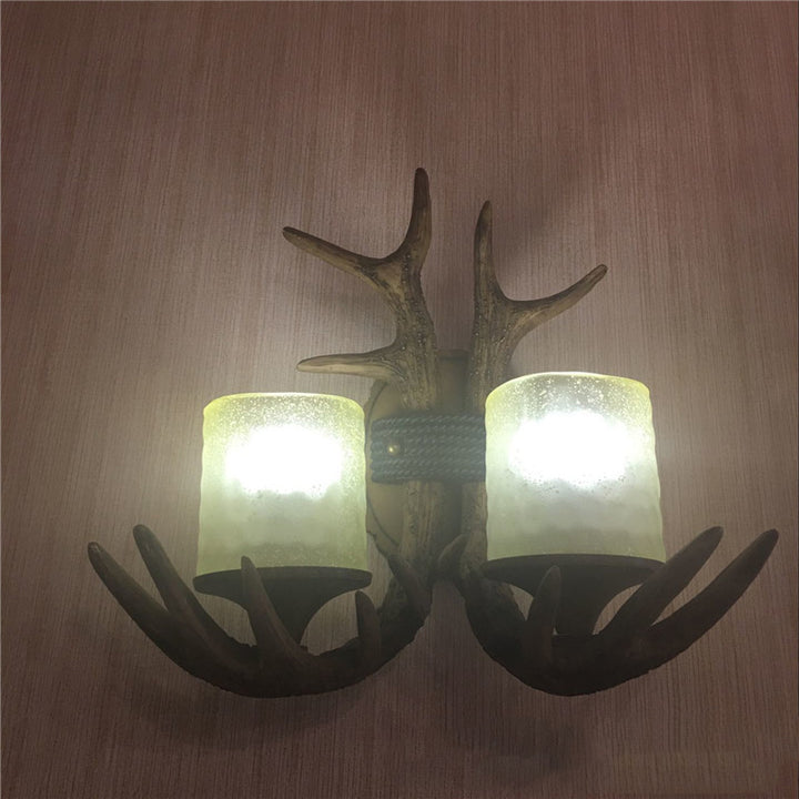 Zeitgenössische kreative Geweih-Zylinderharz-Glas-2-Licht-Wandleuchte für das Schlafzimmer 